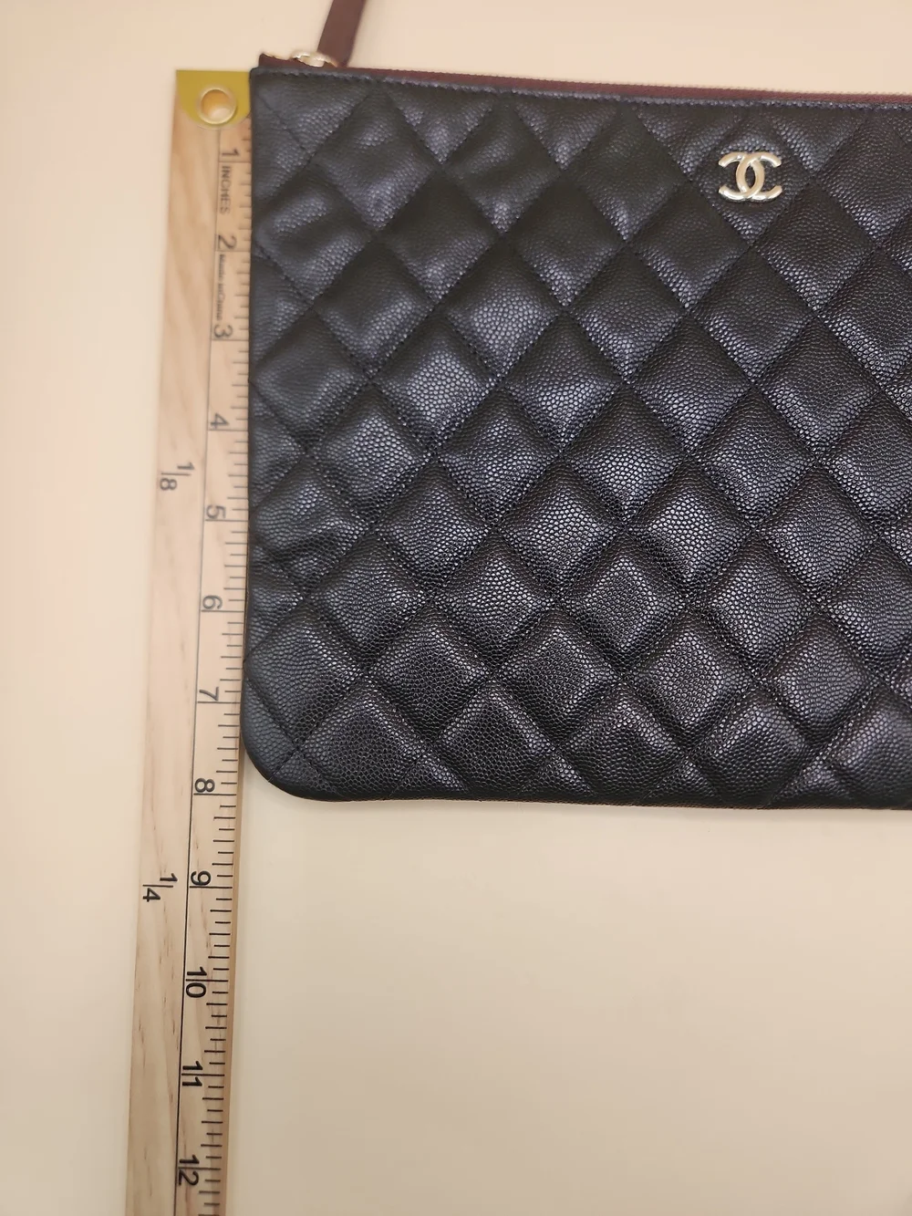 CHANEL Black Quilted Caviar Leather Pouch with Gold CC